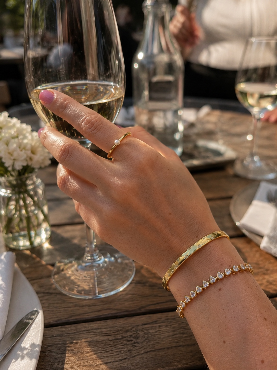 Gold bracelets styled on the wrist