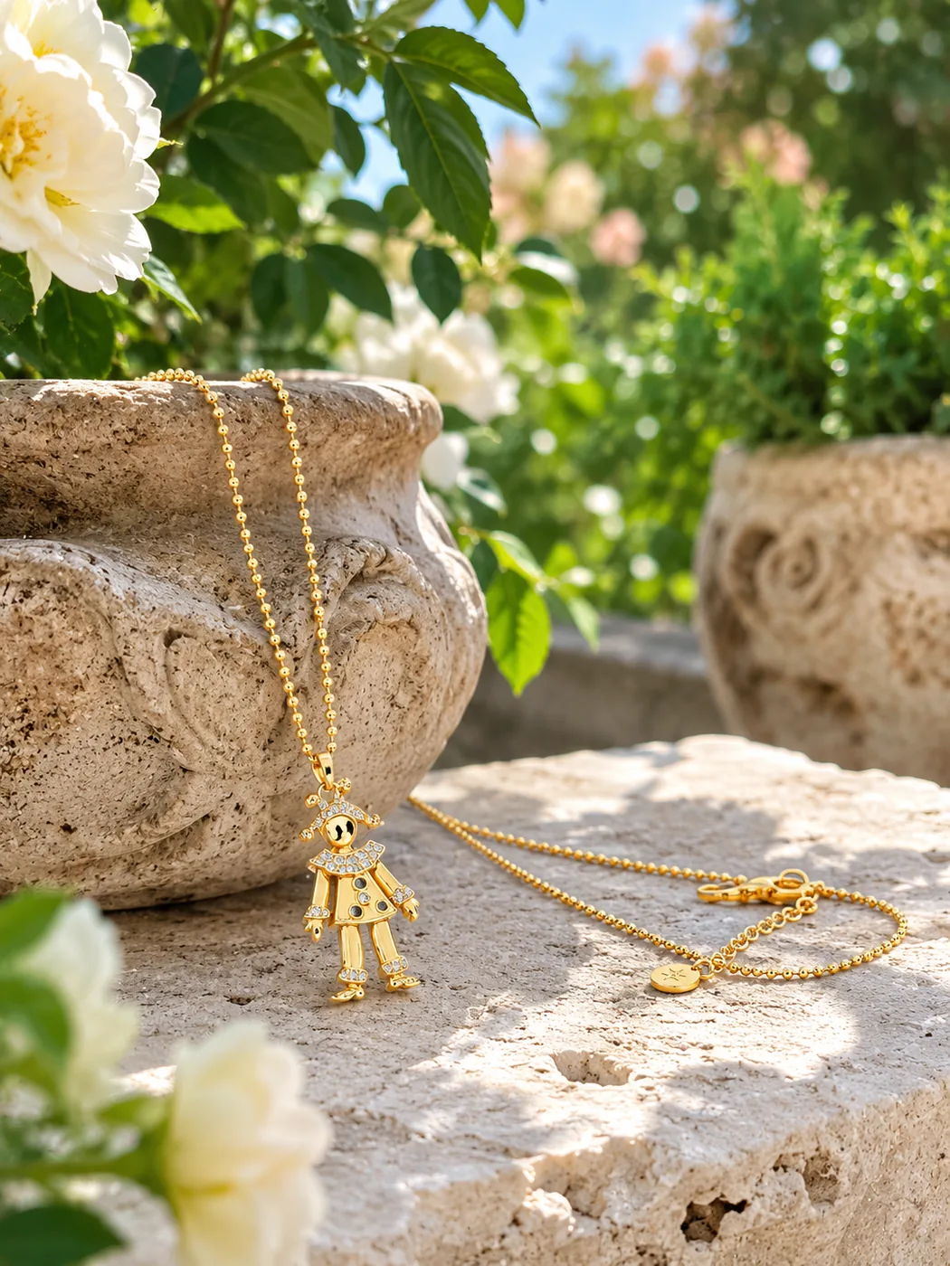 Stacked beaded and chain bracelets worn together